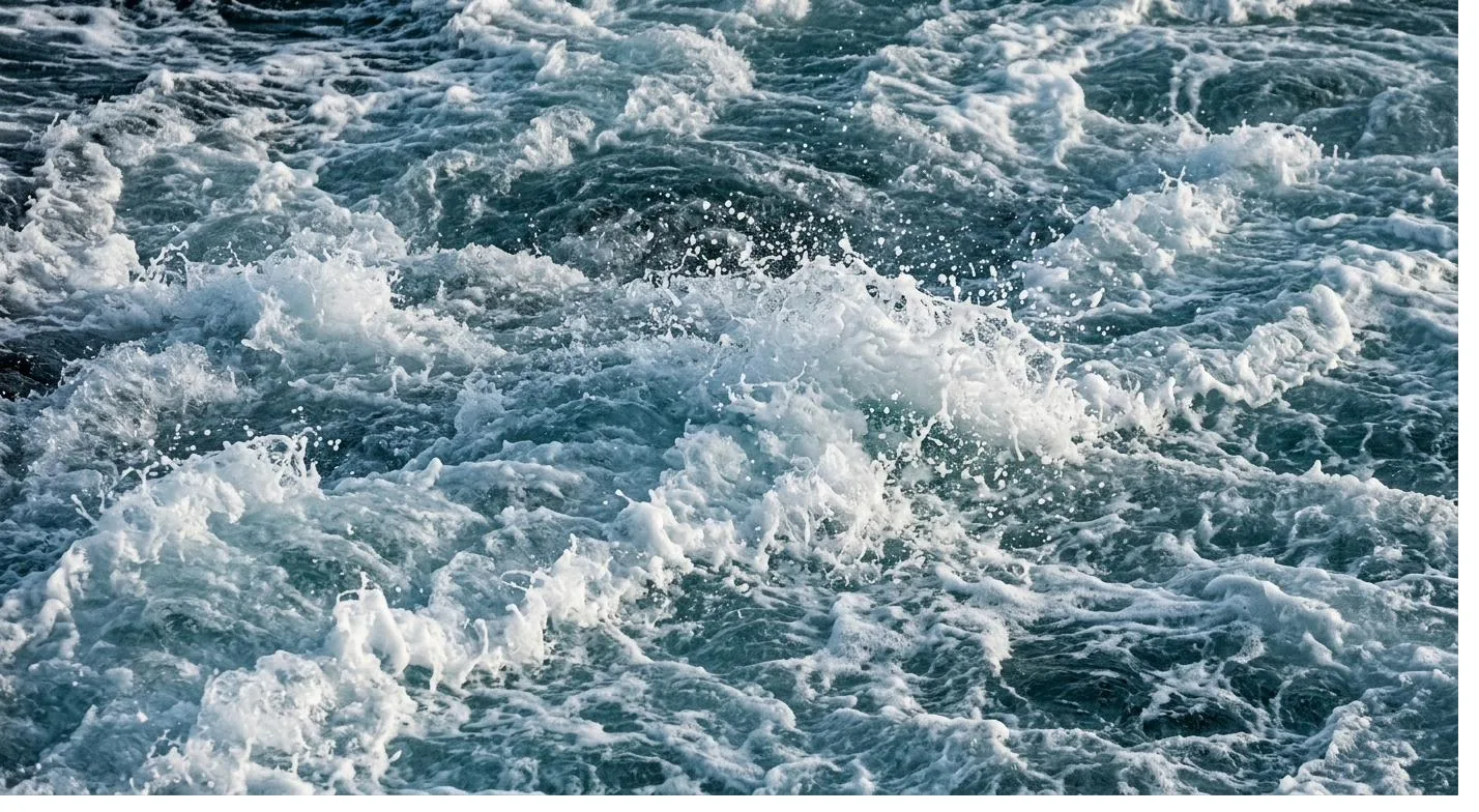 Turbulent, chaotic water representing a scattered state